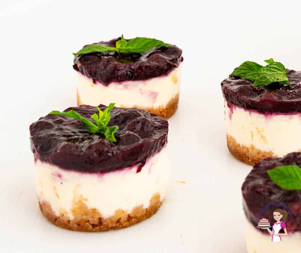 Mini blueberry cheesecakes.