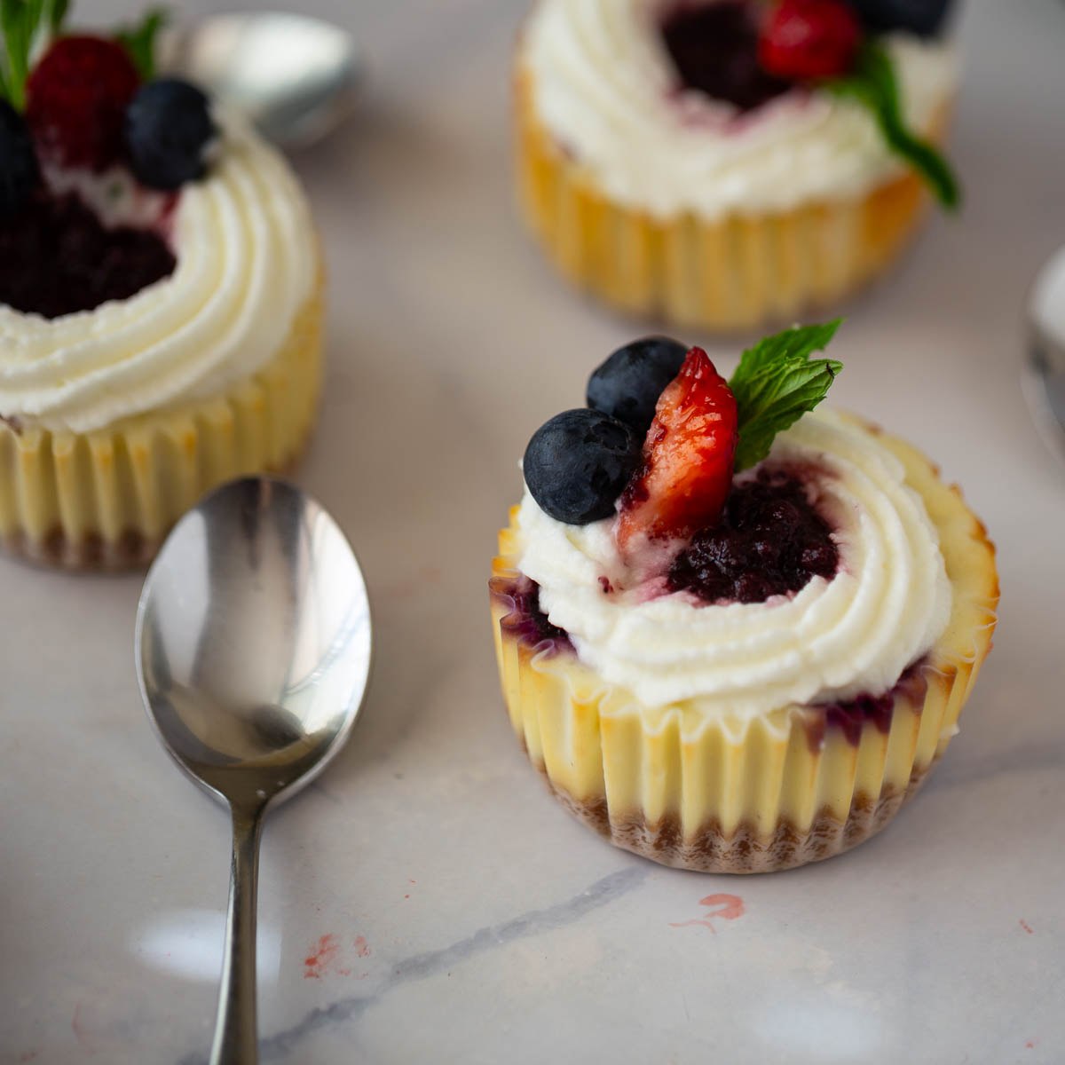 Baked Mini Cheesecakes on the table.