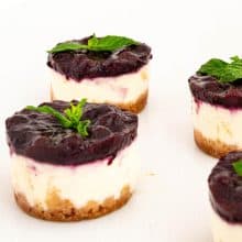 Mini cheesecakes on the table.