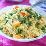A bowl with rice and veggies