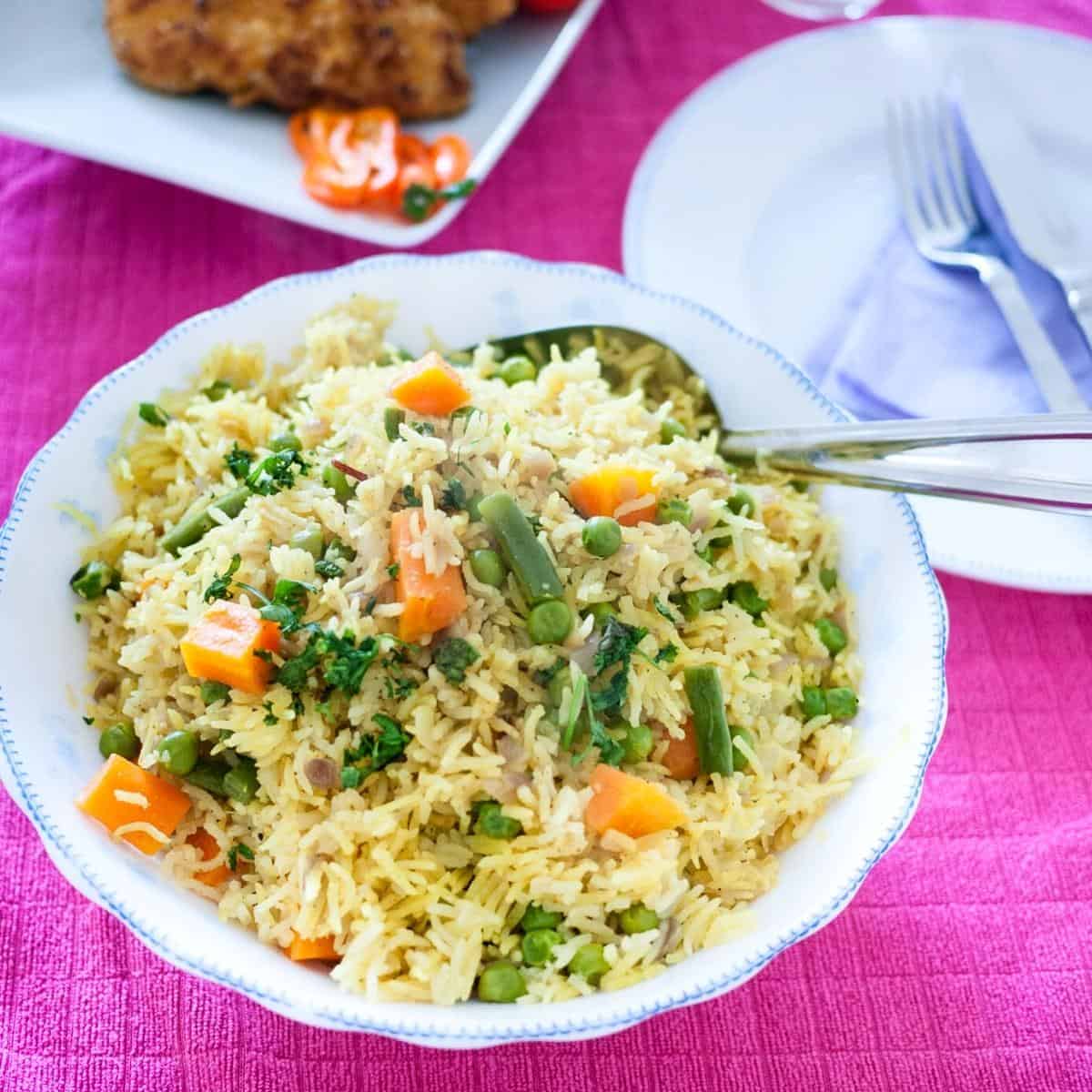 A bowl with rice and veggies