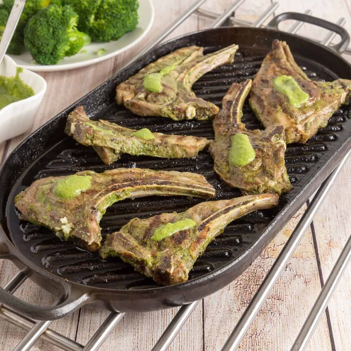 A grill with lamb chops.