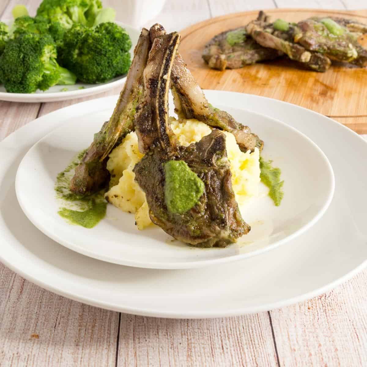 Mashed potato topped with lamb chops.