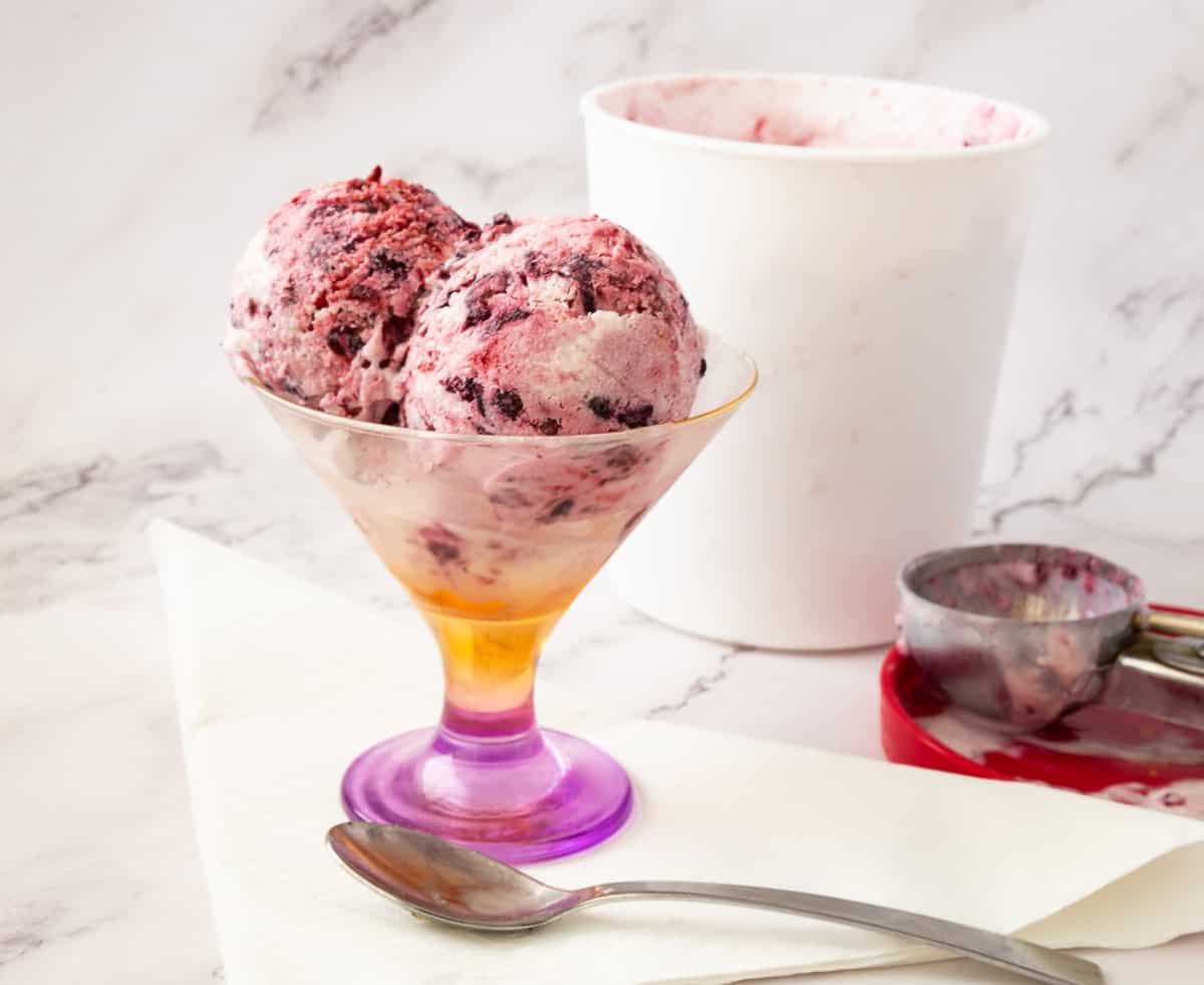 Mixed Berry Ice cream scoops in a bowl.