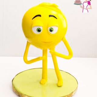 A standing emoji cake.
