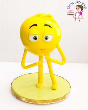 A standing emoji cake.