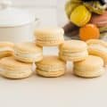 A stack of macarons on the white table