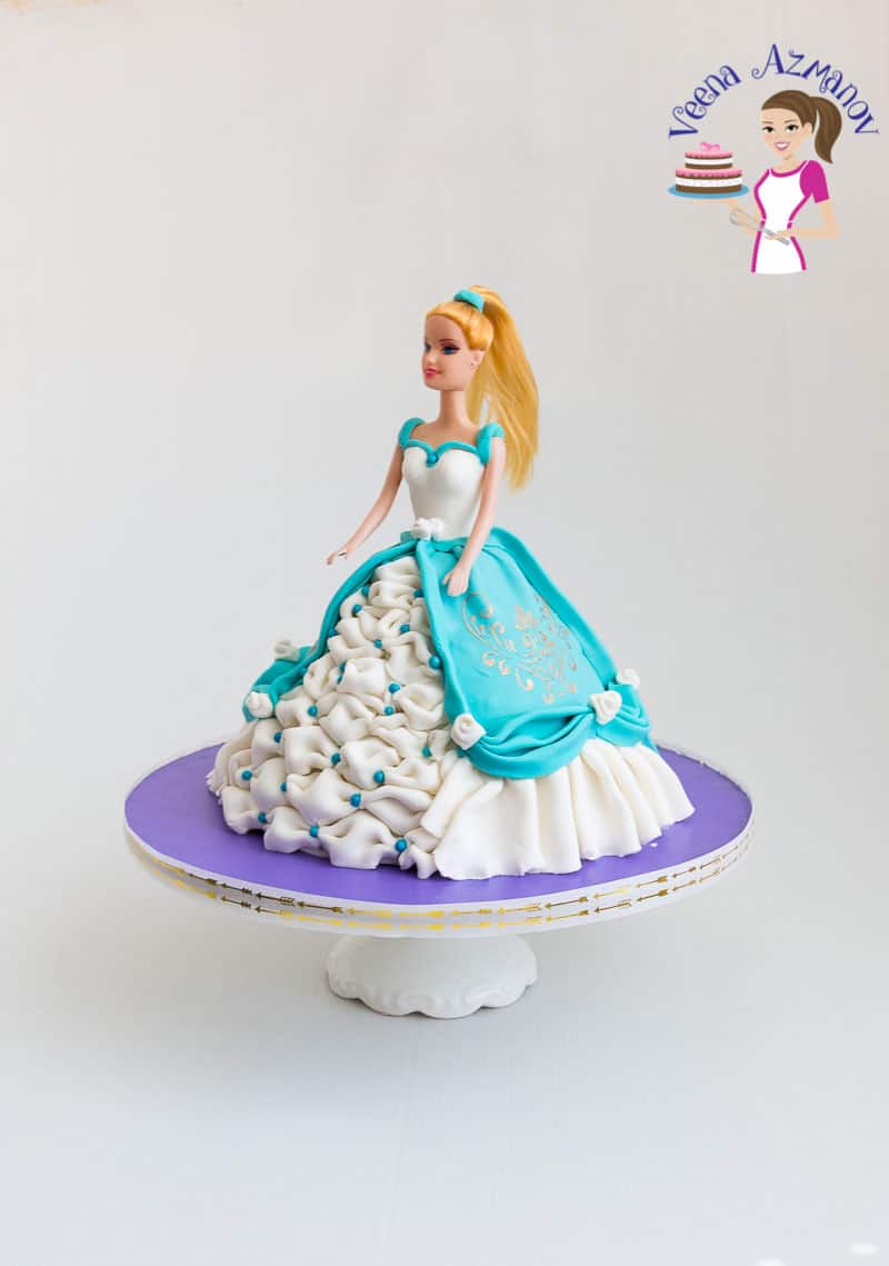 A simple, easy and elegant princess doll cake with step by step video tutorial with recipes and list of tools.