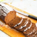 A spiced loaf cake on the board.