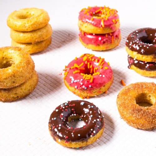 Assorted doughnuts on a table.