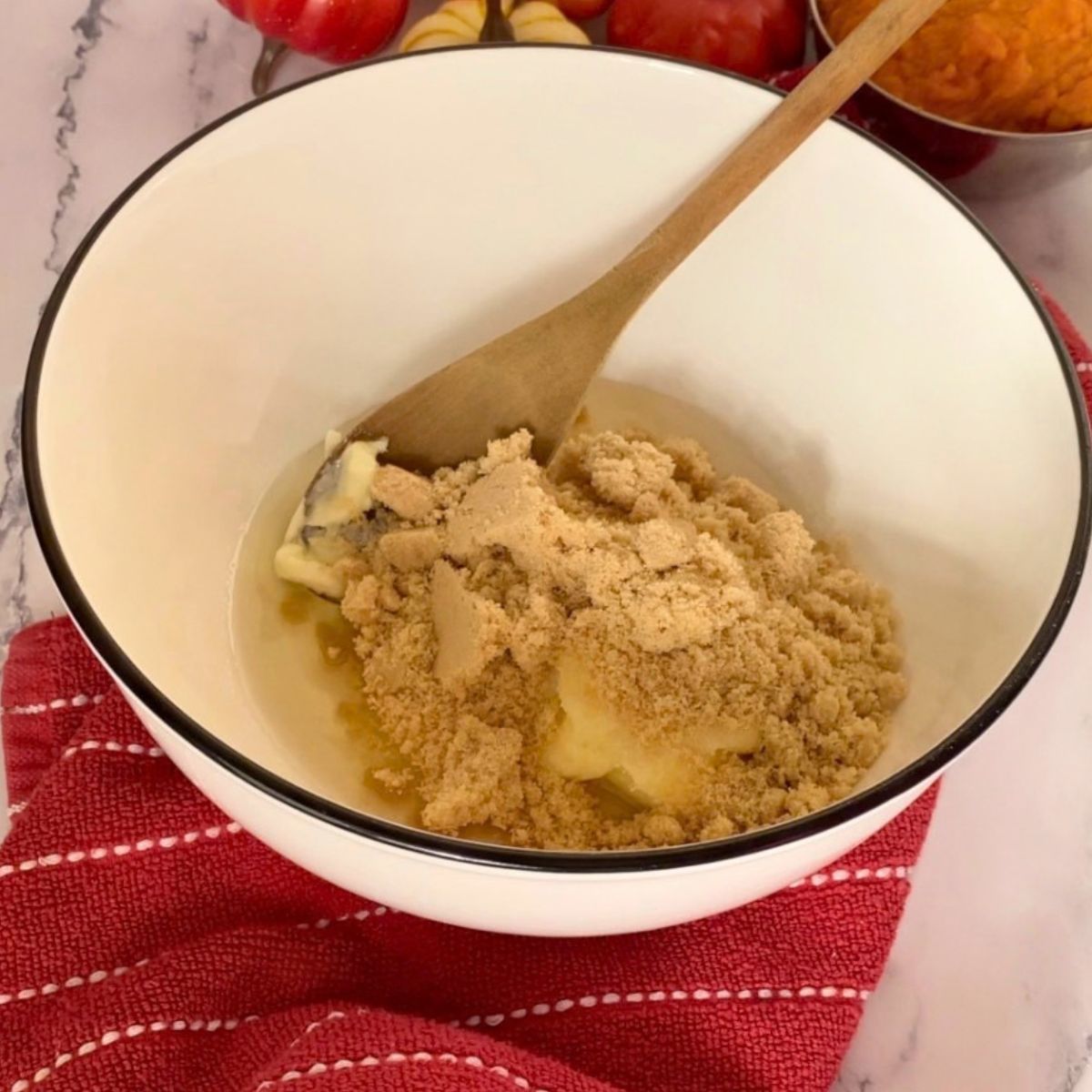 A bowl creaming butter and sugars.