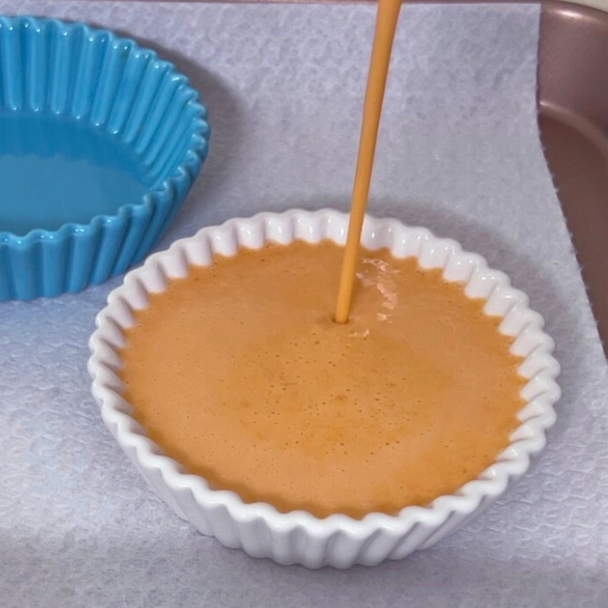 A ramekin with pumpkin creme brulee.