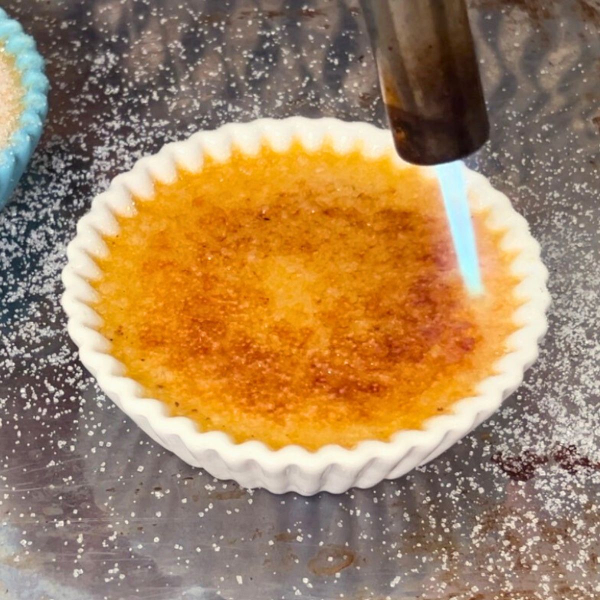 A ramekin with pumpkin creme brulee.