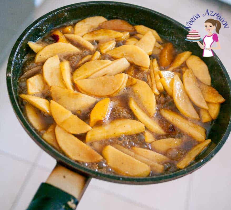 Caramel apples in a frying pan.