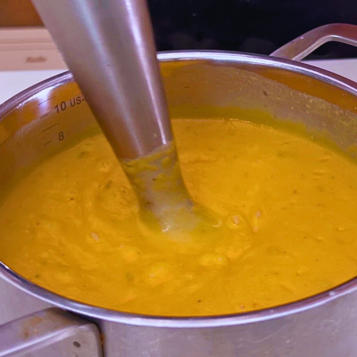 A sweet potato soup in a pot.