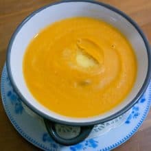 Roasted sweet potato soup in a bowl.
