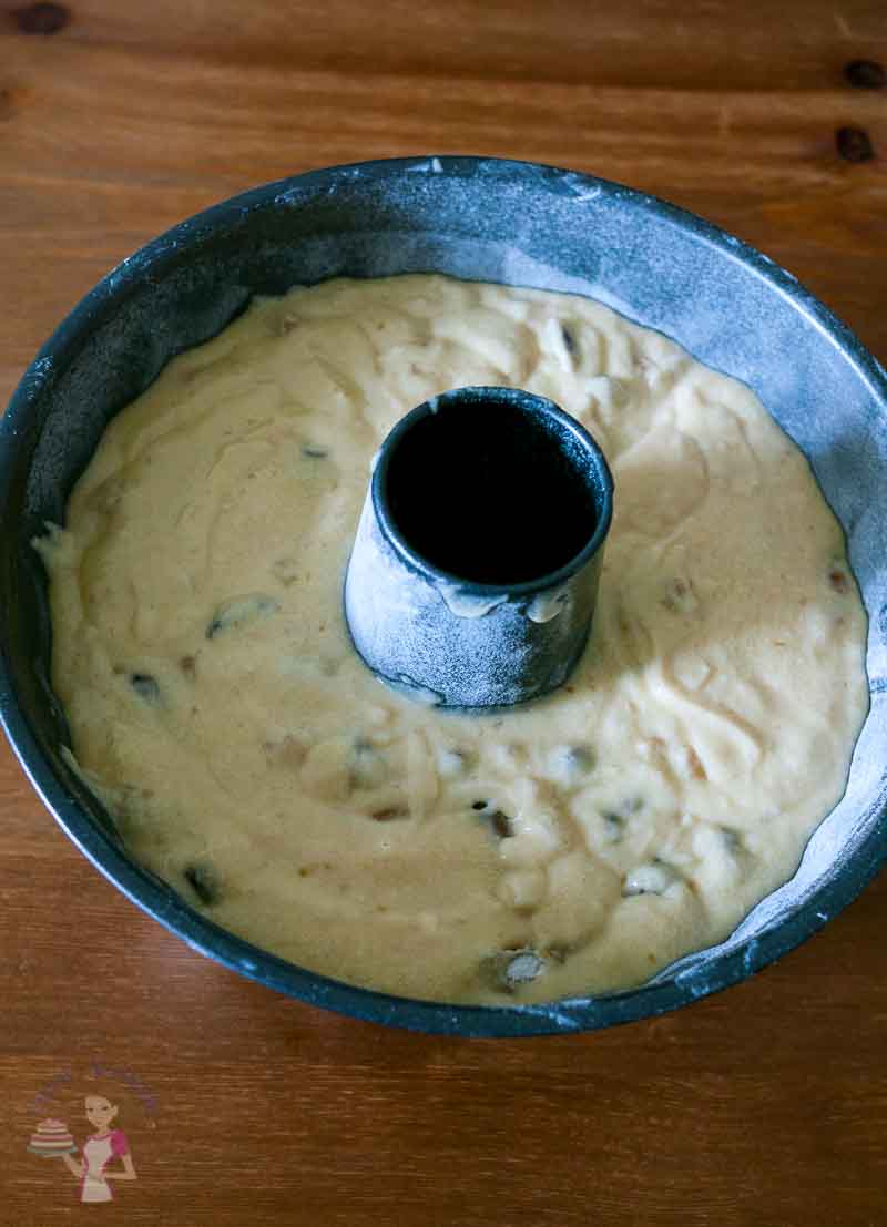Cranberry cake batter in a bundt pan.