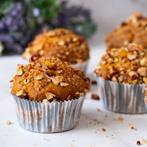 Baked pumpkin spice muffins on the table.