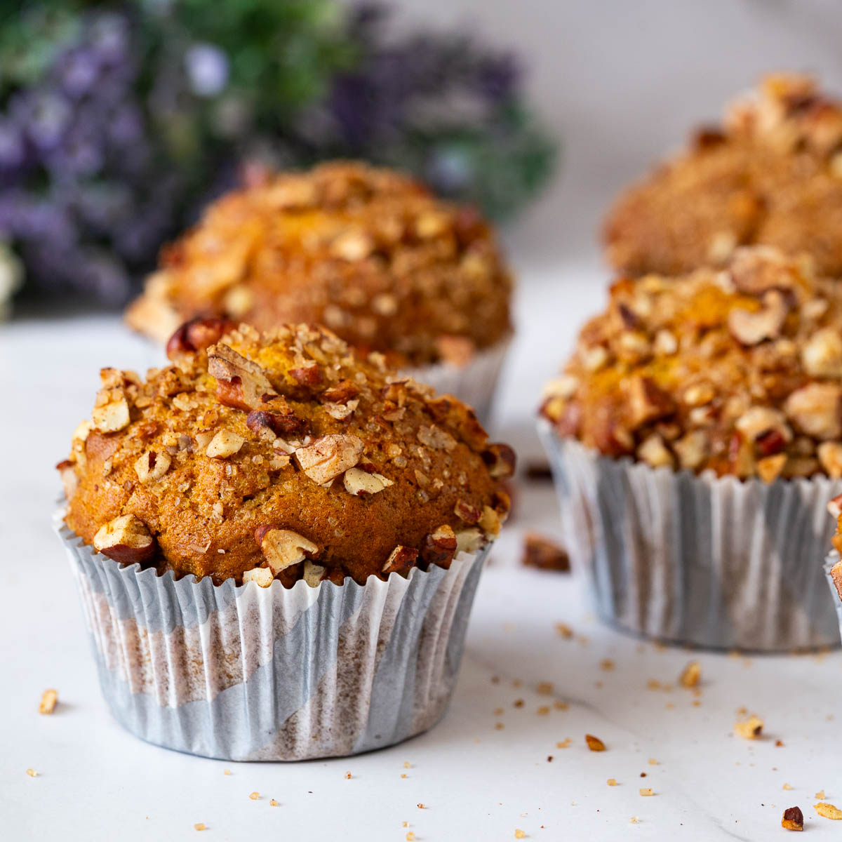 Baked pumpkin spice muffins on the table.