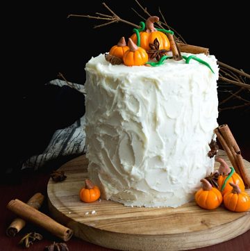 A frosted spice latte cake with fondant pumpkins.