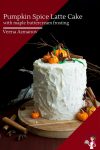 A pumpkin cake with buttercream frosting and pumpkin cake toppers.