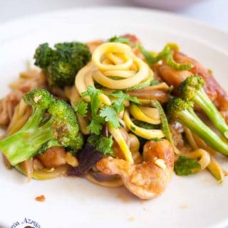 A quick simple and easy Asian recipe Broccoli and Chicken Zucchini noodles stir fry is low carb and get ready in less than 30 minutes.