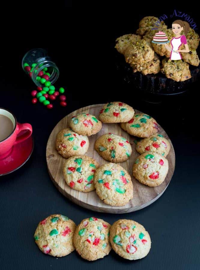 A stack of Christmas cookies on a round board.