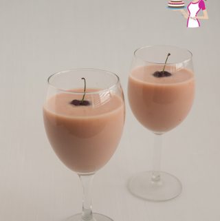 Two glasses with cherry eggnog.