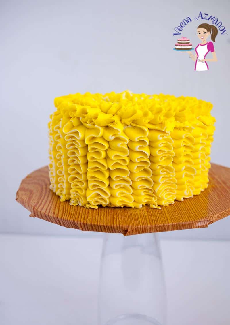 A lemon cake with lemon buttercream frosting.