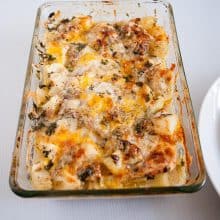 A class dish with baked casserole.