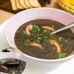 A bowl of black bean soup.
