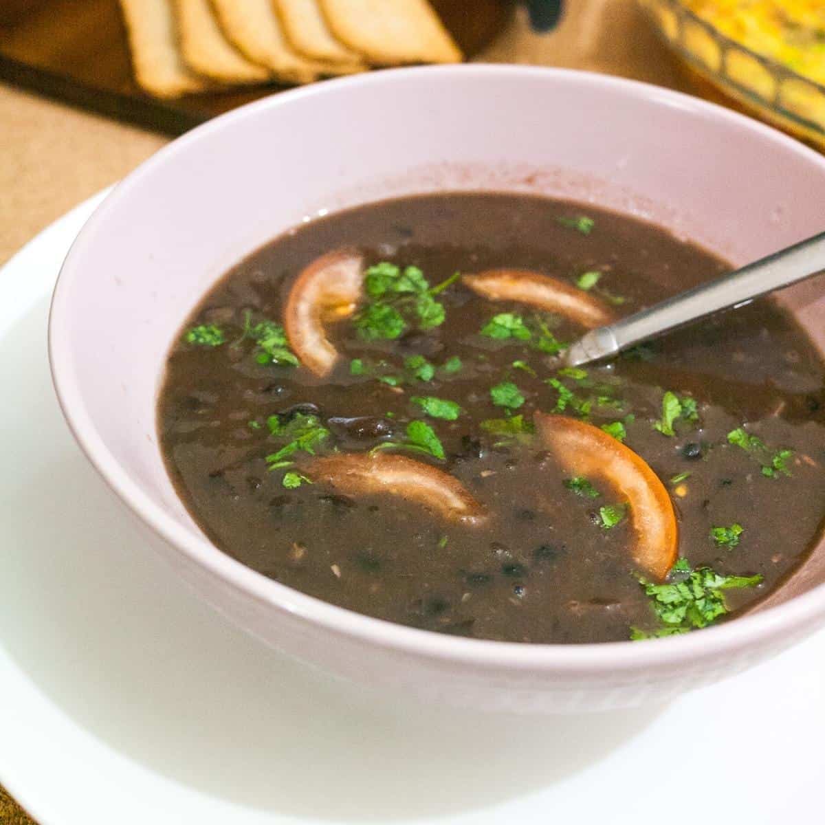 A bowl of black bean soup.
