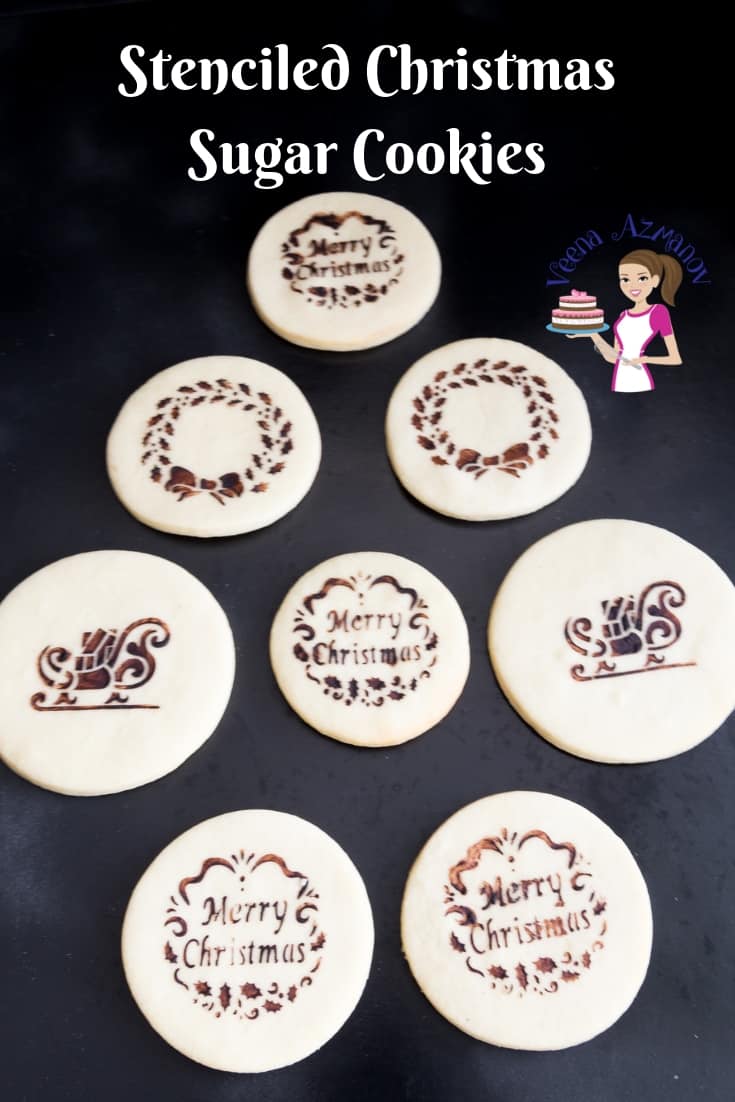 Stenciled sugar cookies on a table.