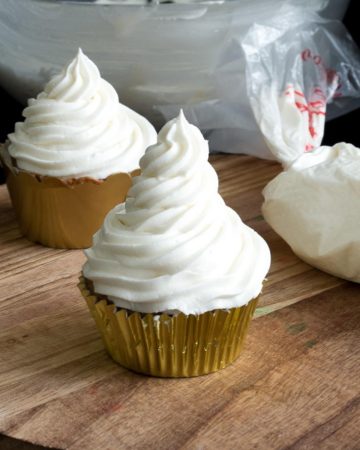Cupcake frosted with bakery frosting.