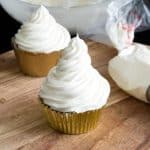 A frosted cupcakes with bakery frosting.
