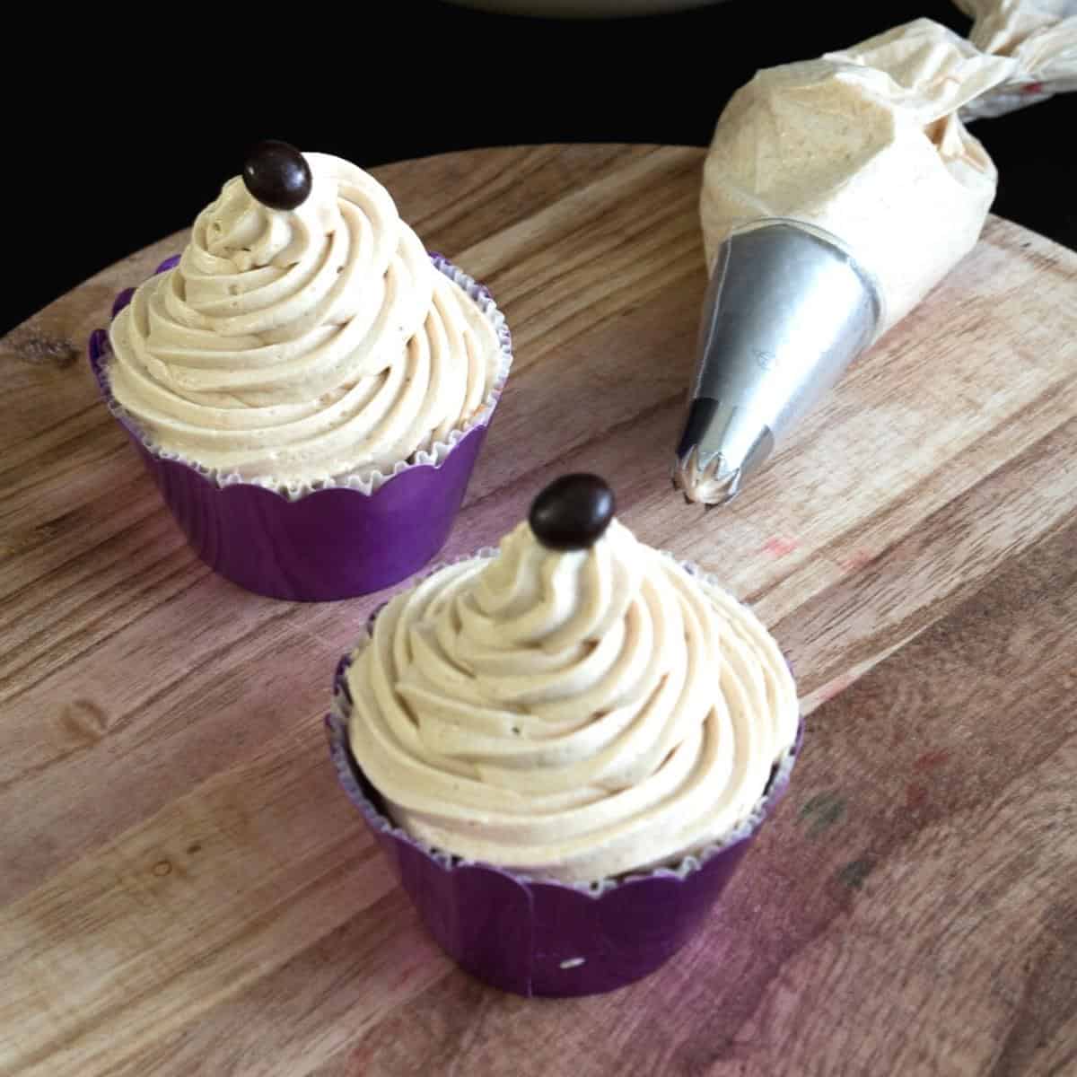 Two Coffee buttercream frosted cupcakes