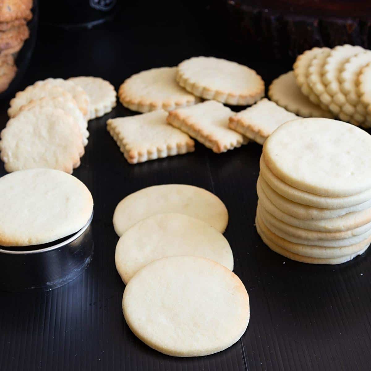 Sugar cookies that do not spread on a black board.
