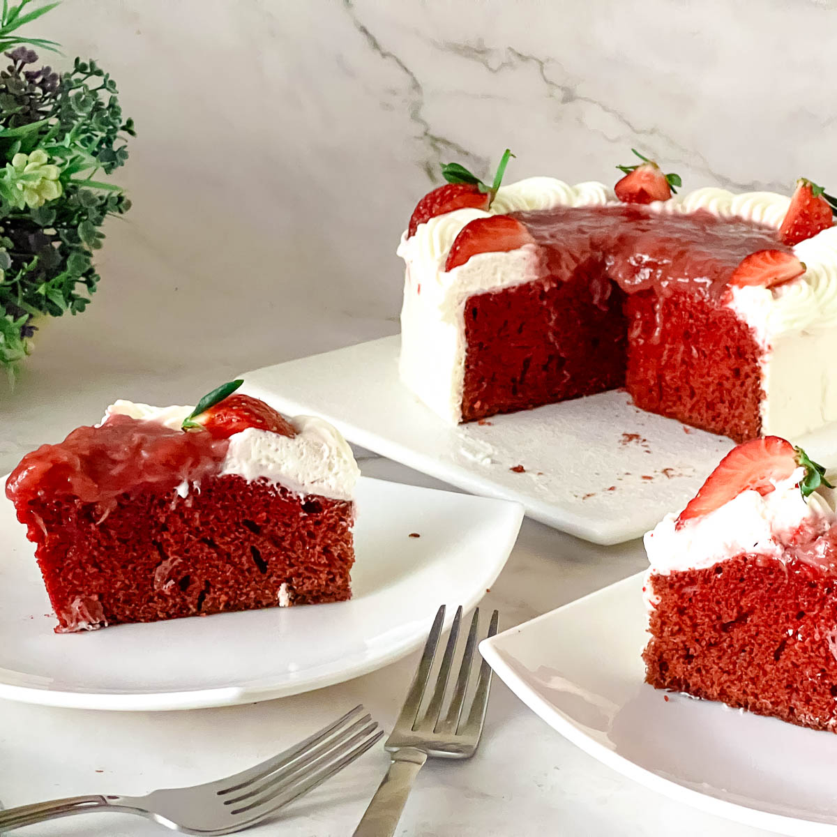 A sliced frosted heart cake recipe.