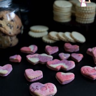Heart shaped sugar cookies on a table.