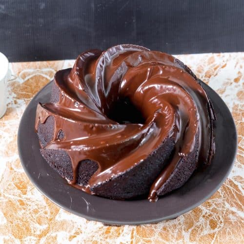 A bundt cake on a black cake