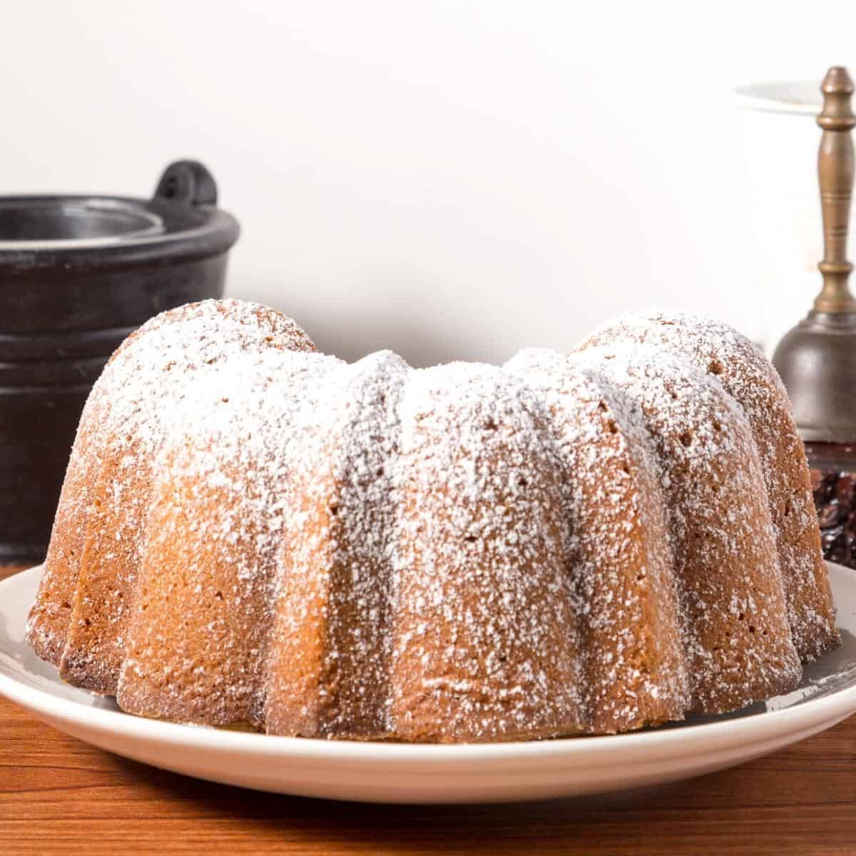 Bundt cake dusted with powdered sugar.