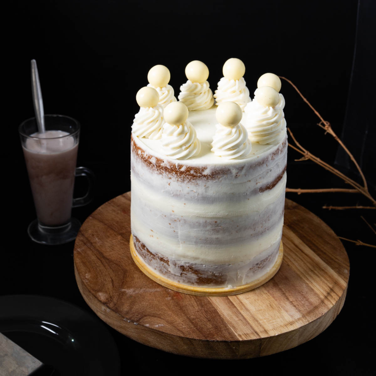 Naked layer cake on the table.