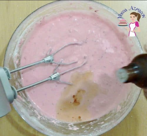 Progress Pictures - Adding vanilla and strawberry extract to the strawberry cake