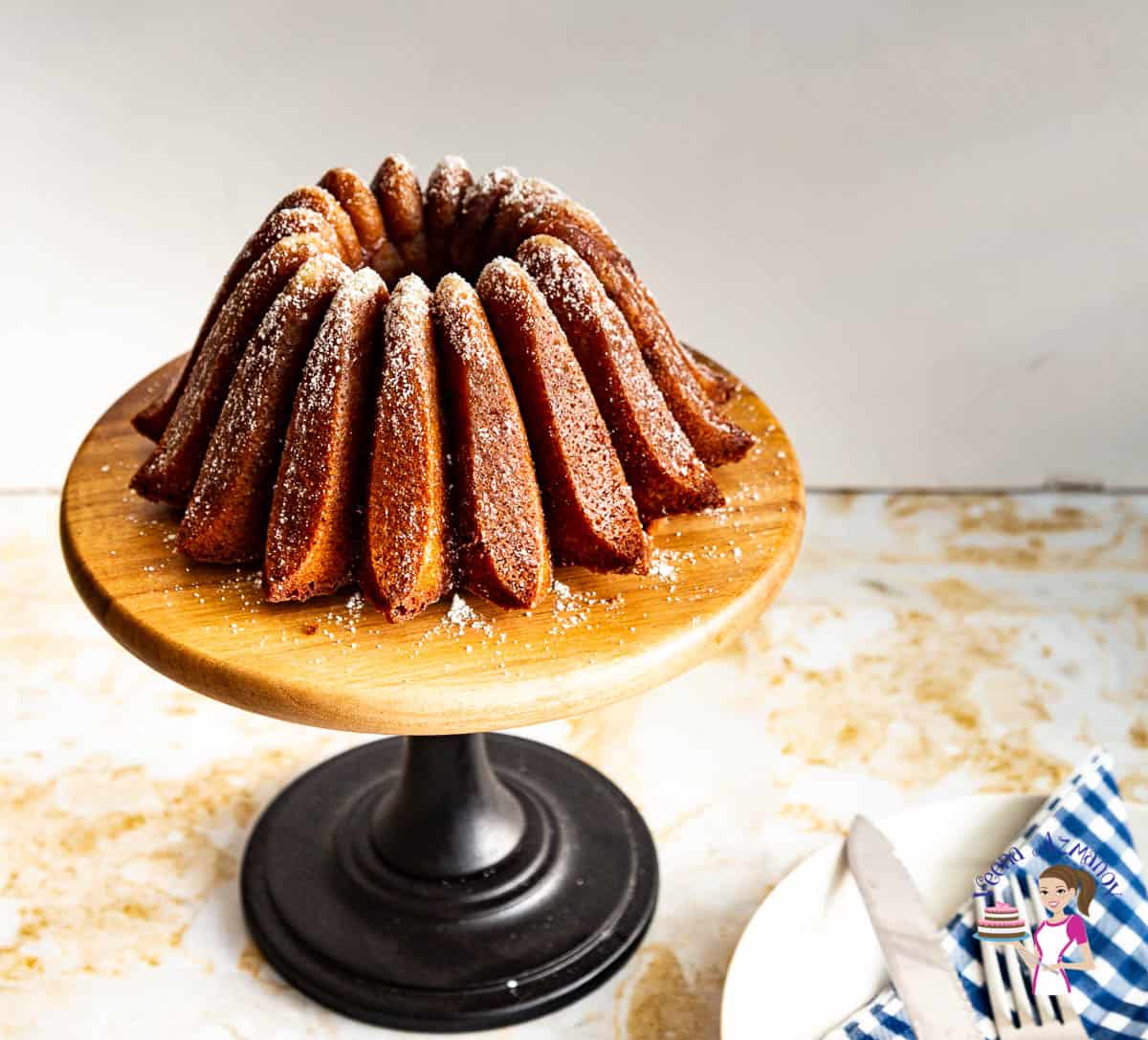 Bundt cake on a wooden cake stand