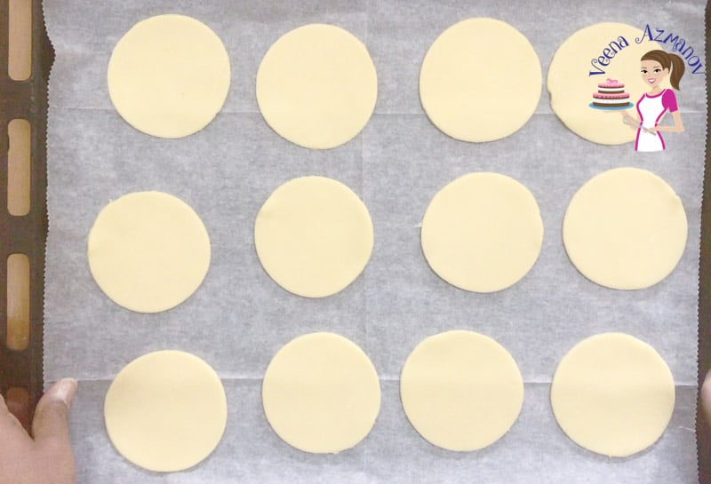 Cookie dough cut into circles.