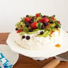 Pavlova on a cake stand.