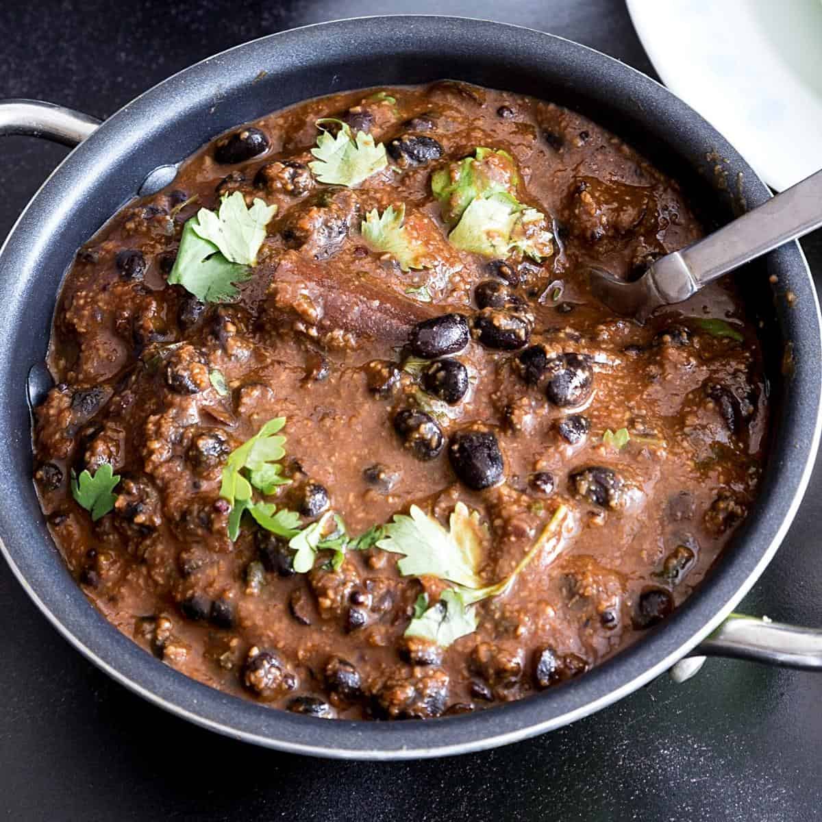 Black beans curry in a kadai.