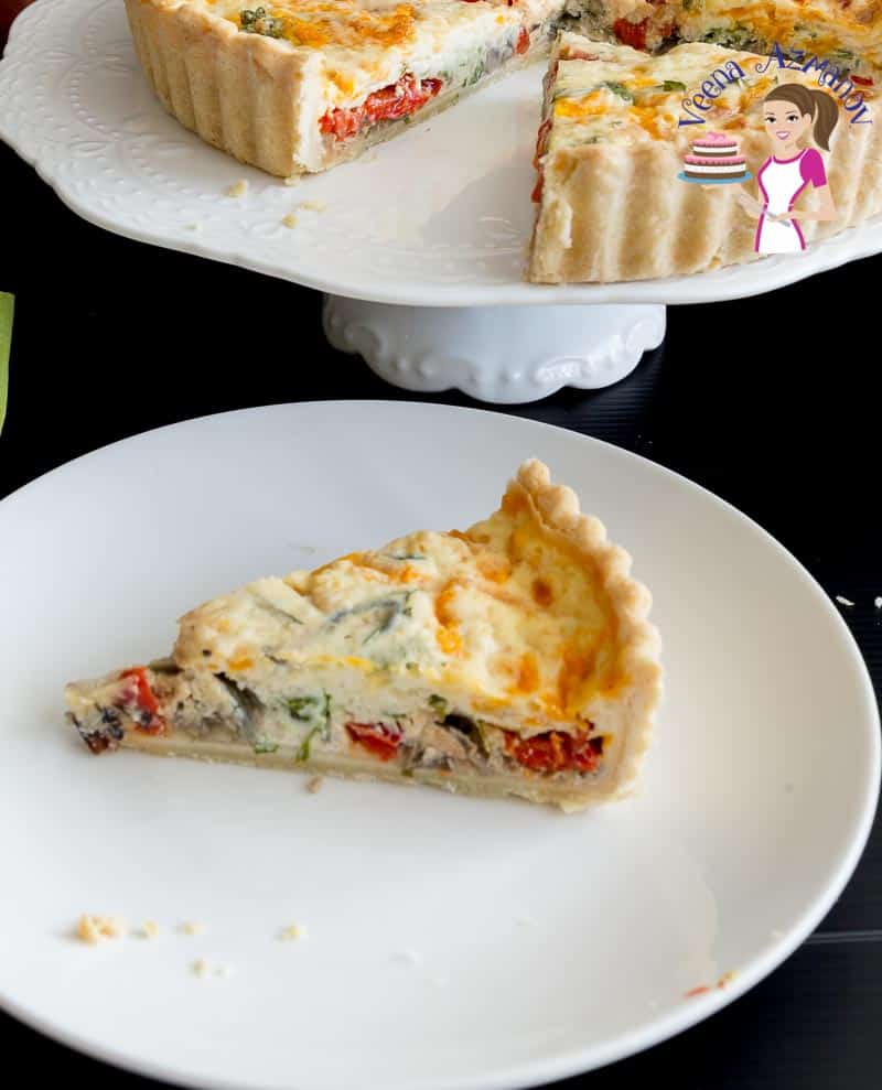 A piece of red peppers quiche on a plate.