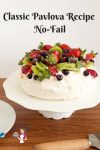A pavlova on a cake stand.