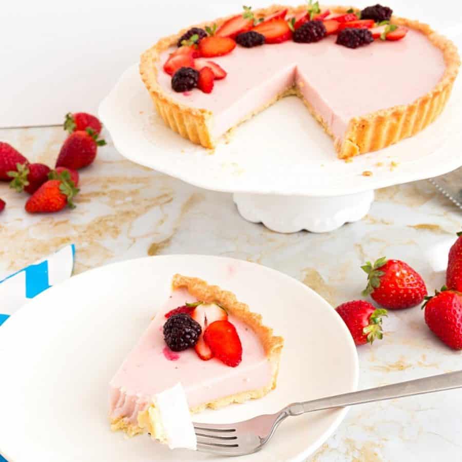 A tart shell with strawberry panna cotta.